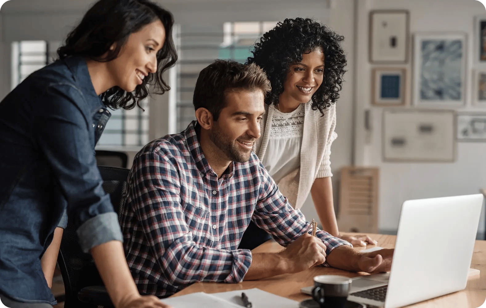 Three people working